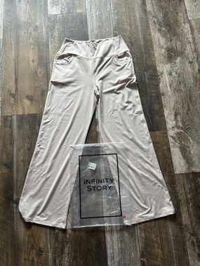 NFINITY cream sheer packaging bag with black logo